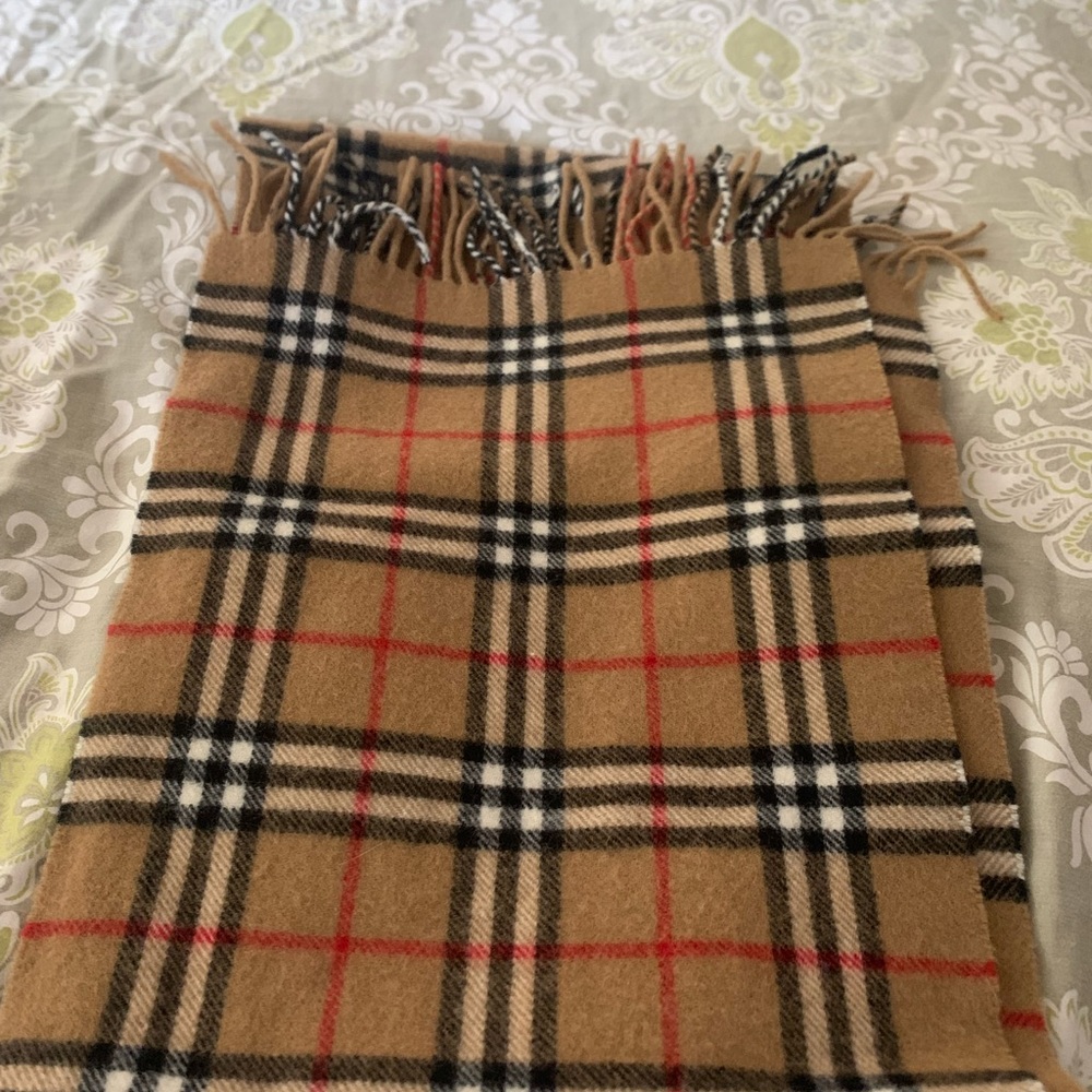 Burberry (not sure if it’s real)plaid scarf in woo